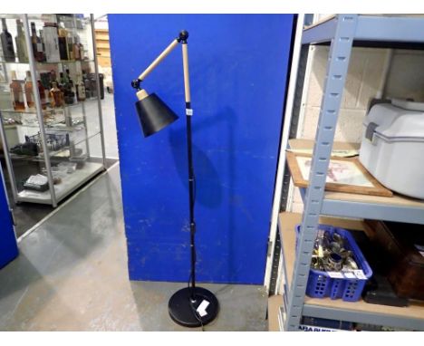 A modern adjustable floor lamp in beech and black metal. Not available for in-house P&amp;P 