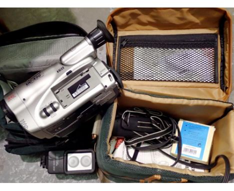 Canon UC-X50 video camera and accessories. Not available for in-house P&amp;P 