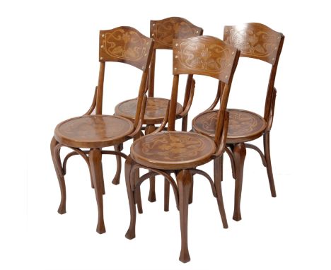 Set of four Jugendstil chairs; Austria, ca. 1900.Wood, decorated with bas-relief motifs.Measurements: 95 x 43 x 44 cm.Set of 