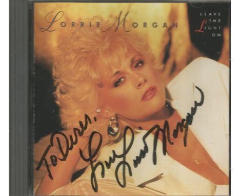 Lorrie Morgan signed Leave The Light On CD. Music autograph. Good condition. All autographs come with a Certificate of Authen
