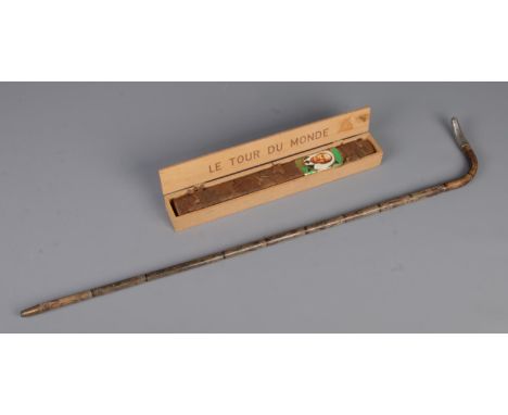 A early 20th century bamboo walking cane stick (L71cm) with sterling silver handle, with a "Le Tour Du Monde" large cigar (L3