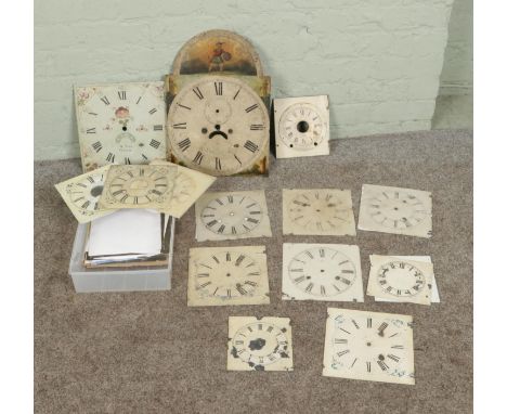 A box of assorted enamel clock dials to include W. Snow, Seth Thomas and several hand painted examples.