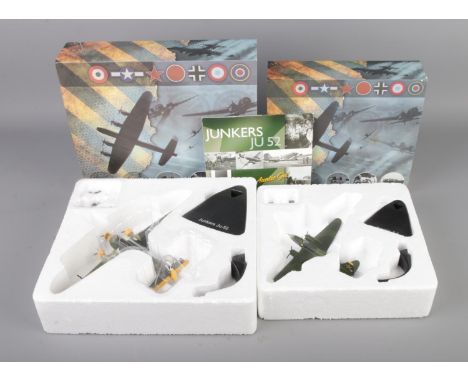 Two boxed Atlas Editions WW2 diecast model planes on stands to include Junkers JU52 and Llyushin II-4.