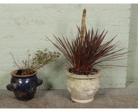 A quantity of plant pots in various shapes and sizes, including some smaller ceramic pots, tallest 43cm.