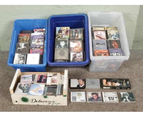 Four boxes of assorted CD's, to include U2, Adele, Queen, Madonna, John Lennon, Elvis Presley, Rihanna, Snoop Dogg, T-rex etc