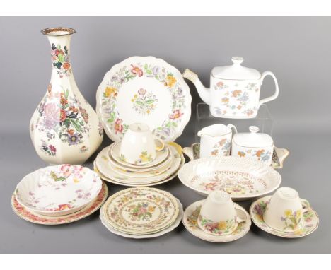 A vintage Royal Doulton ceramic collection, including a large vase (H35cm), assorted plates and "Madrigal" tea set, containin
