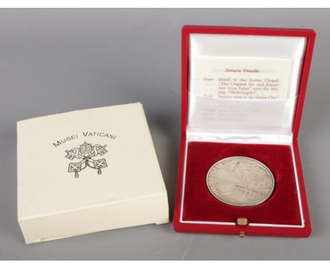 A 1993 Vatican Museum sterling silver medal, depicts the famous Sistine Chapel ceiling painted by Michelangelo, with box and 