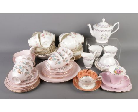 A large collection of ceramic tea services, including Royal Albert "Bluebell", Tuscan "Blue Star", Duchess "June Bouquet" and