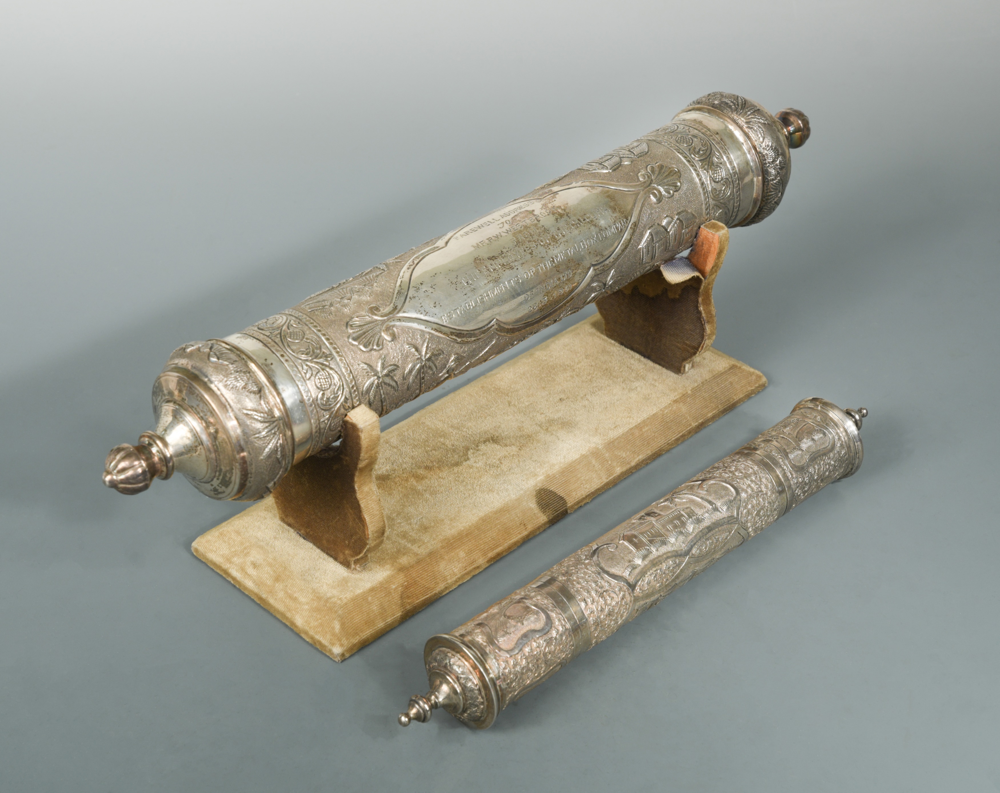 An Indian silver 'Farewell Address' scroll holder, in Cheffins Fine Art