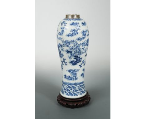slender baluster form, painted with two sky dragons pursuing the pearl amongst cloud wisps, the neck reduced and later applie