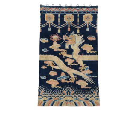 worked with a sky dragon chasing the cosmic pearl beneath swags of beads and lion masks 227 x 130cmPile generally excellent a