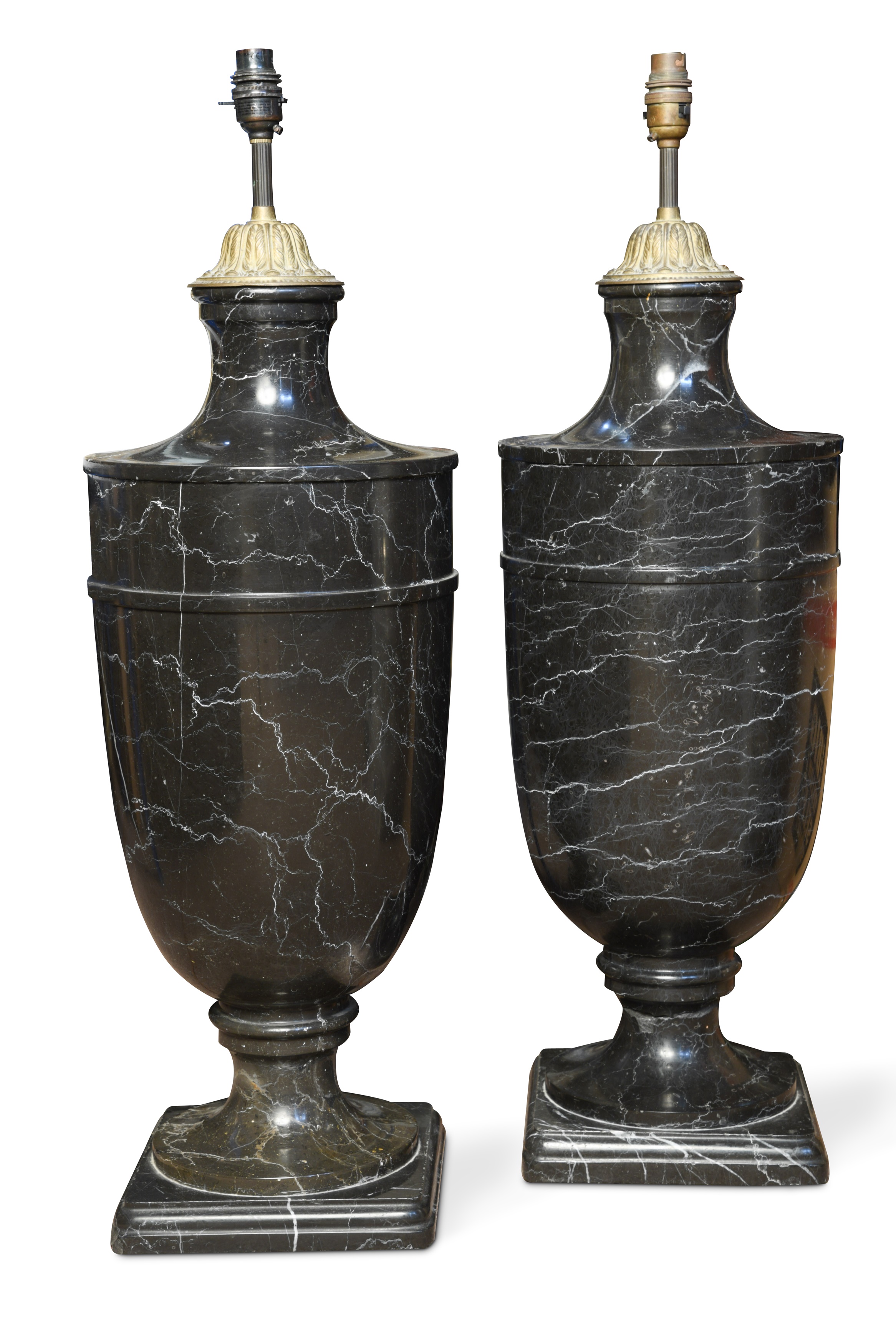 A pair of black marble lamp bases, in Cheffins Fine Art