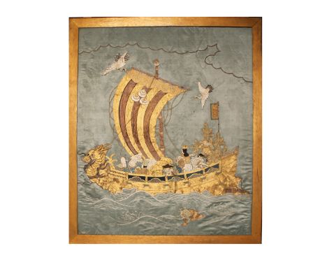 depicting the treasure ship Takarabune, worked in coloured and gold wrapped threads on a light blue silk ground, 78 x 65.5cm,
