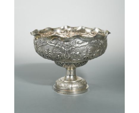 of frilled circular form, repoussé in high relief with six bracket edged reserves depicting different hunting scenes, compris