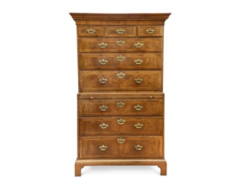 fitted with three short and six long drawers with brushing slide with original brass handles, raised on shaped bracket feet 1