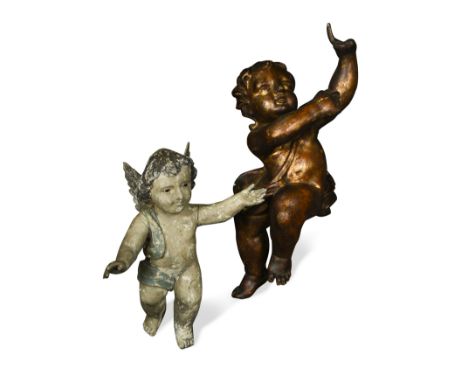 modelled in flight, 31cm high, together with a gilt decorated moulded model of a cherub, 43cm (2)Footnote: Provenance: Proper