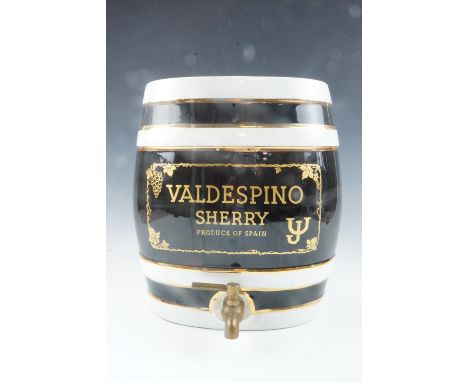 A large ceramic Valdespino sherry barrel with brass tap, 32 cm