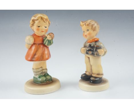 A boxed Hummel figurines "My Toy Train" and "Puppet Princess"