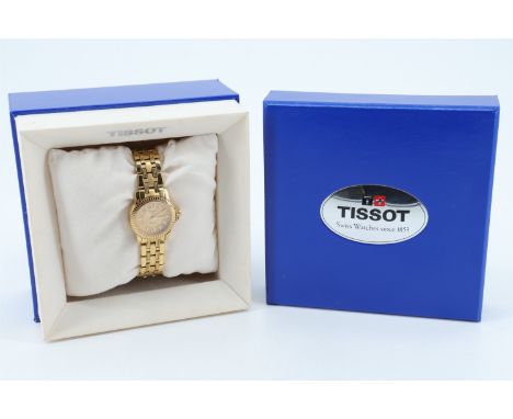A lady's Tissot Ballade gold plated wristwatch, having a quartz movement and gilt face with date aperture, the case waterproo