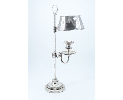 A Victorian columnar candle lamp, having an integral shade and gadrooned base and candle holder, bearing the mark of Padley, 