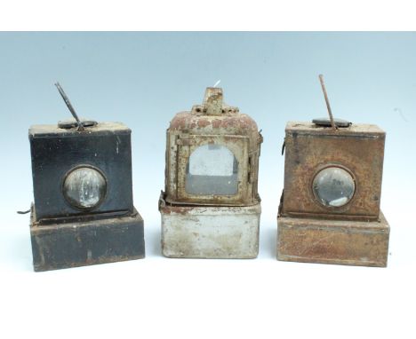 Two British Railway (M) lanterns and one other lamp