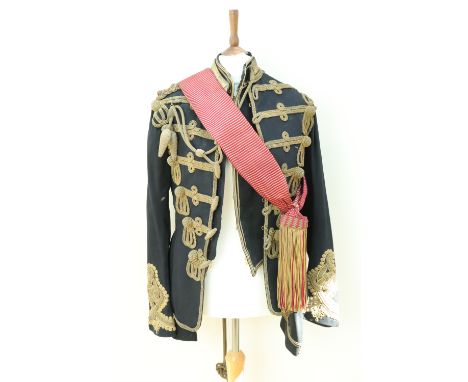 A Hussars officer's dress tunic, waistcoat and sash, bearing a label inscribed Capt A B Broadhurst