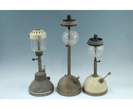 Two Tilley lamps and a Bi Alladin lamp, tallest 53 cm