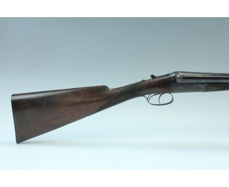 A Cogswell and Harrison Avant Tout double barrelled side by side 12 bore boxlock ejector shotgun, having a splinter fore grip