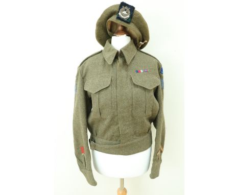 A Second World War Canadian Battledress Blouse of a private of the Calgary Highlanders, 3rd Division, bearing War Service and