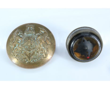 A Second World War escape and evasion button compass, being a large brass General Service button with left-hand-screw back, o