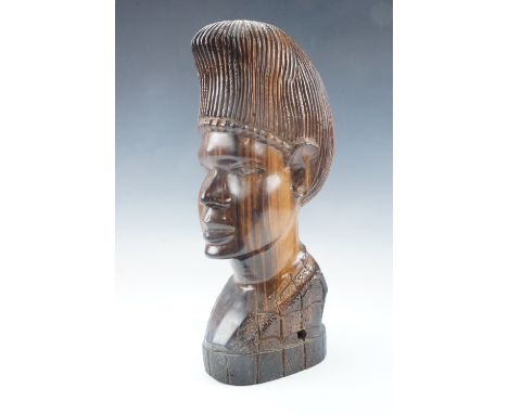 An African carved hardwood lamp base, 38 cm