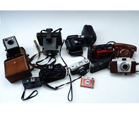 Sundry vintage cameras, including a Kodak "Brownie Model I" box camera, a Polaroid Land Camera, a "Vest Pocket Kodak" etc