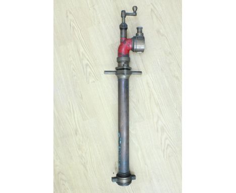 A fireman's brass stand pipe and valve key by CHN Morris and Son's ltd, Inventors and Patentees, fire engineers, Manchester, 