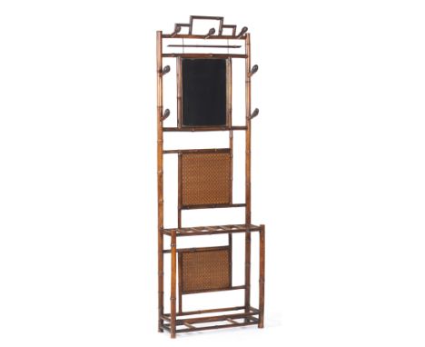 A Victorian coat and walking stick standBamboo and rattanCentral mirror, seven coat hooks and umbrellas and sticks holderEngl