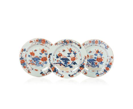 A set of three "Imari" platesChinese export porcelainPolychrome floral, rock, fence and insect decorationQianlong reign (1736