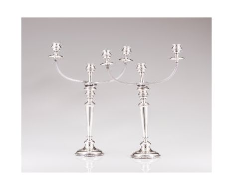 A pair of LEITÃO & IRMÃO candlesticks and three branch serpentinesSilver 833/000Faceted shaft, serpentines and cups on oval s