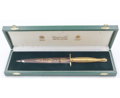 Wilkinson Sword Royal Marines Commando commemorative Fairbairn Sykes Commando dagger, engraved and gilt with blued blade, in 