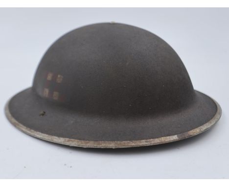 WWII British Mk II helmet, bearing the insignia of the Scots Guards. This helmet was found in Italy. They were part of the la