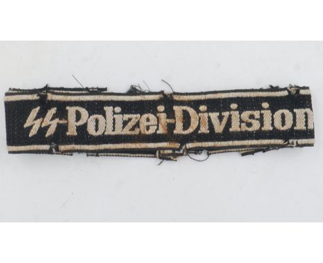 Third Reich SS-Polizei-Division cuff title, removed from a uniform. Marked Beveo-Wuppertal. Passes the black light test. UK P