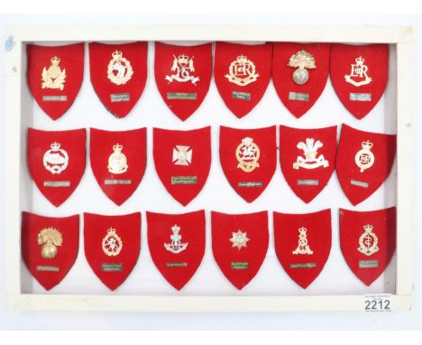 A collection of mounted 20th century British cap badges, each mounted. UK P&amp;P Group 1 (£16+VAT for the first lot and £2+V