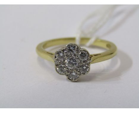 18CT YELLOW GOLD DIAMOND DAISY CLUSTER RING, approx. 3.3grams in weight. Bright well matched brilliant cut diamonds, 7 in tot