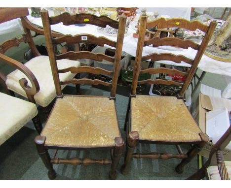 LANCASHIRE LADDER BACKS, pair of rush seated ladder backs with turned stretchers 