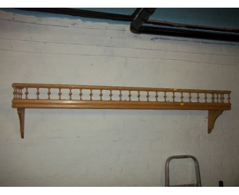 A VINTAGE SOLID PINE GALLERY SHELF