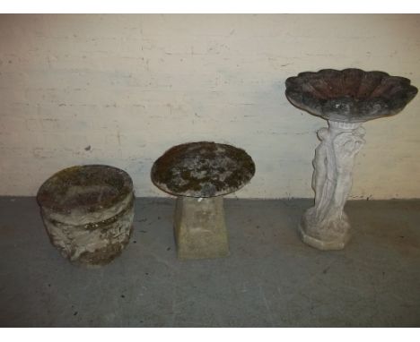 THREE CONCRETE GARDEN ORNAMENTS TO INCLUDE A GARDEN STATUE BIRD BATH, A MUSHROOM AND A PLANTER.