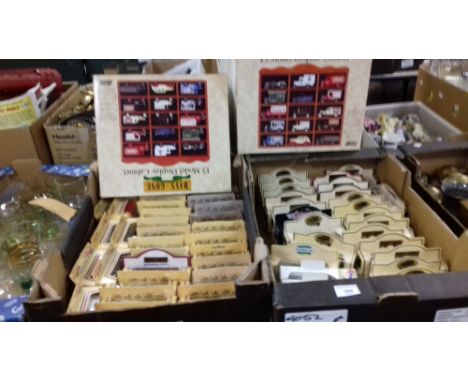 A QUANTITY OF LLEDO "DAYS GONE" BOXED COMMERCIAL MODEL VEHICLES, together with two Days Gone Display Cabinets  (62)