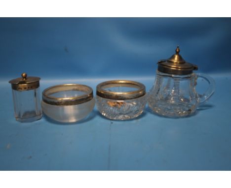 FOUR SILVER TOPPED GLASS SALTS / MUSTARD POTS