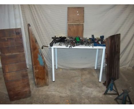 A SELECTION OF TOOLS CAR JACKS, AXLE STANDS AND CAR RAMPS.