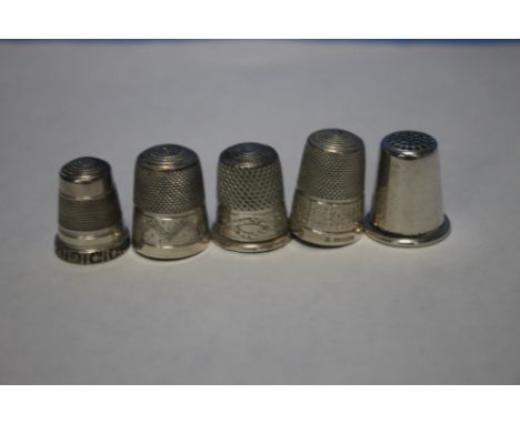 FIVE SILVER THIMBLES
