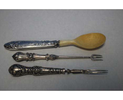 TWO SILVER PICKLE FORKS AND A SILVER HANDLED HORN SPOON  (3)