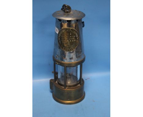 A VINTAGE MINERS LAMP MADE BY THE PROTECTOR LAMP AND LIGHTNING CO. LTD. OF ECCLES, MANCHESTER, SECURITY NO. 98